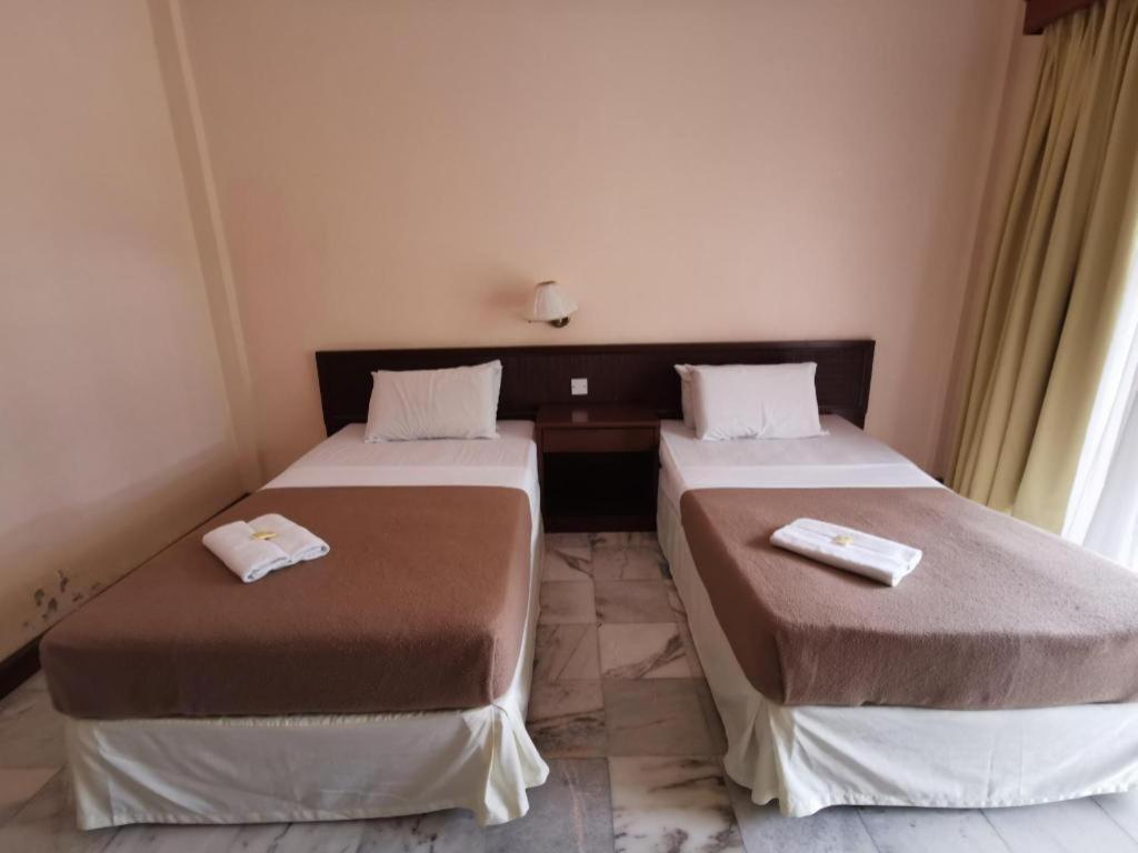 Oyo 89972 Borneo Paradise Beach Hotel كوتا كينابالو المظهر الخارجي الصورة